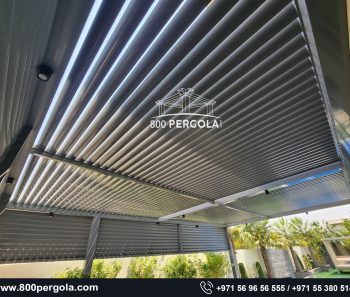 Aluminium Pergola with fixed louvers @ Arabian Ranches 2 , Dubai. We 800 Pergola are leading pergola developer and manufacturer company in Dubai. Our team of experts is dedicated to helping you create the backyard of your dreams with our customized pergola and gazebo designs. We offer a variety of finishes like wooden pergola, aluminum pergola, bioclimatic pergola, smart pergola, automatic pergola, retractable pergola and modern pergola, all designed to complement your outdoor space and meet your specific needs.